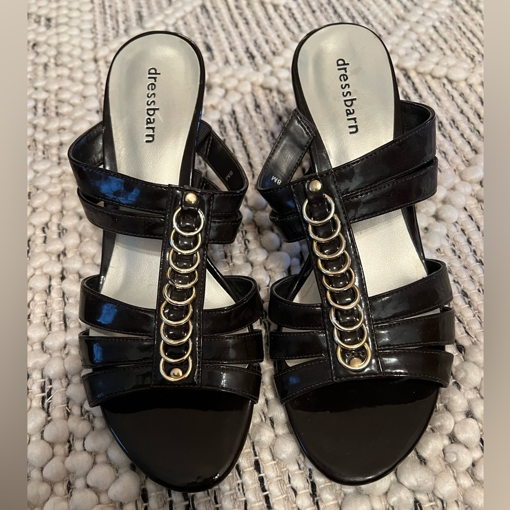 Dress sandals with 3 in heel. Brown with gold loop trim.  Like new.